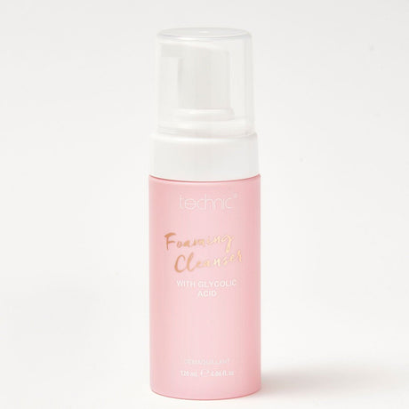 A foaming cleanser bottle in front of a white background.