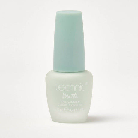 A bottle of pastel matte nail varnish in the shade Minty on a white background