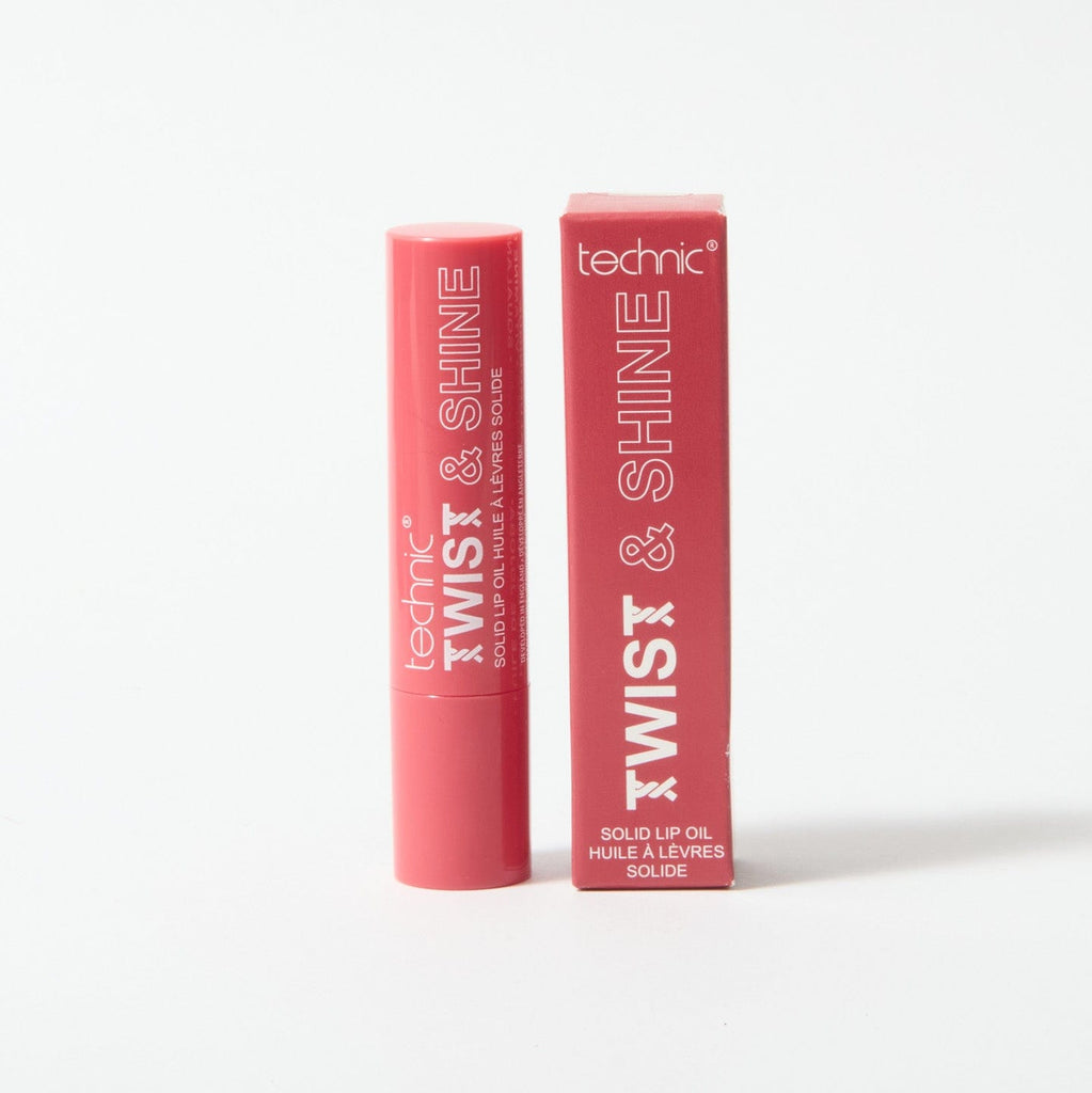 A twist and shine lip oil in the shade Strawberry Kiss on a white background with the box packaging next to the product 