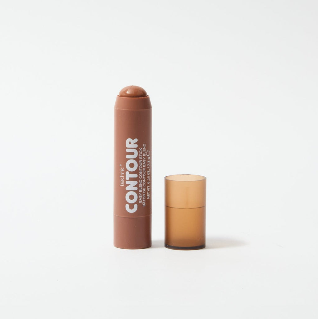 An opened contour stick in the shade Cool Dark in front of a white background.