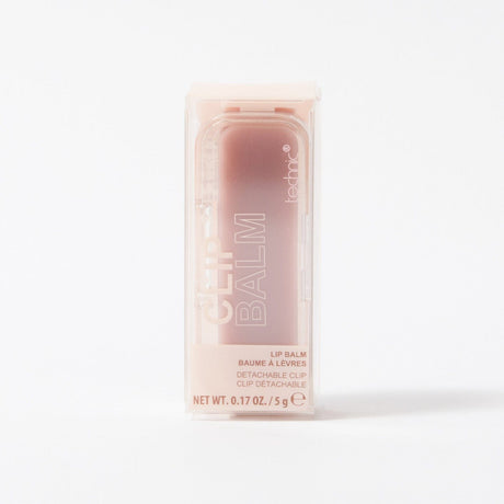 Lip balm container with visible brand name on a white background