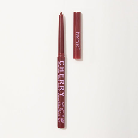 A lip liner pencil in the shade CHERRY NOIR, shown with its cap removed and placed beside it on a clean white background. 