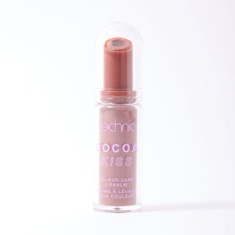 Technic Cocoa Kiss Colour Care Lipbalm in a clear cylindrical tube with a transparent cap, showing the brown lipbalm stick inside, on a white background.