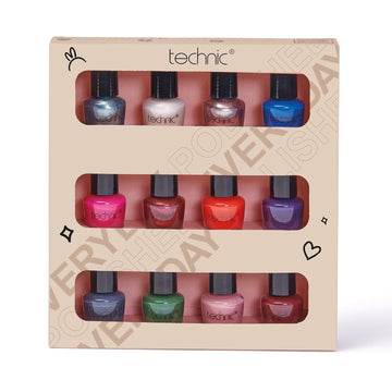 The mini nail varnish giftset on white background. It is in a beige and pink box and has cut outs at the front for the products to be seen.