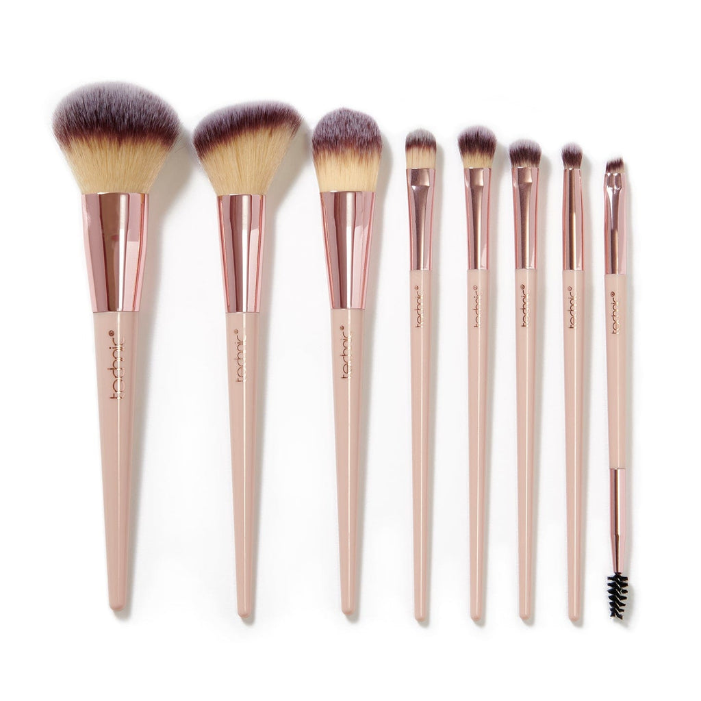 The 8 brushes out of the giftset packaging on a white background.